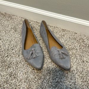 Grey suede tassel flats